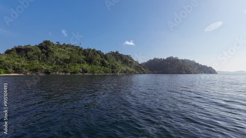 Beautiful landscape, sea and hills. The sky is blue. Mandeh, Padang, Indonesia photo