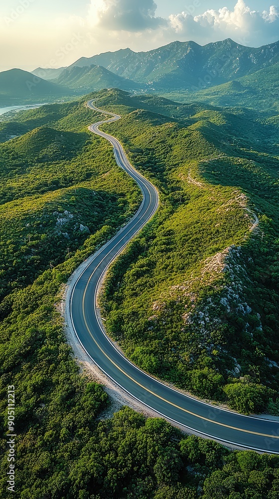 Aerial view asphalt road on the green forest, Curve asphalt road on mountain green forest, Countryside road passing green forest and mountain. Aerial view asphalt road on the green forest, Curve asphalt road on mountain green forest, Countryside road passing green forest and mountain.