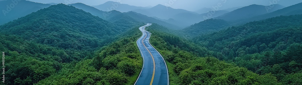 Aerial view asphalt road on the green forest, Curve asphalt road on mountain green forest, Countryside road passing green forest and mountain. Aerial view asphalt road on the green forest, Curve asphalt road on mountain green forest, Countryside road passing green forest and mountain.