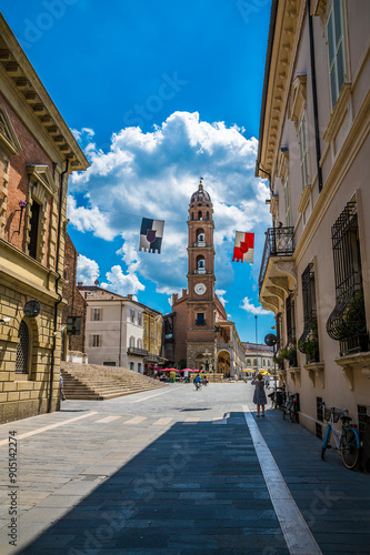 A view down a street towards the Popolo square in Faenza, Italy  in summertime photo