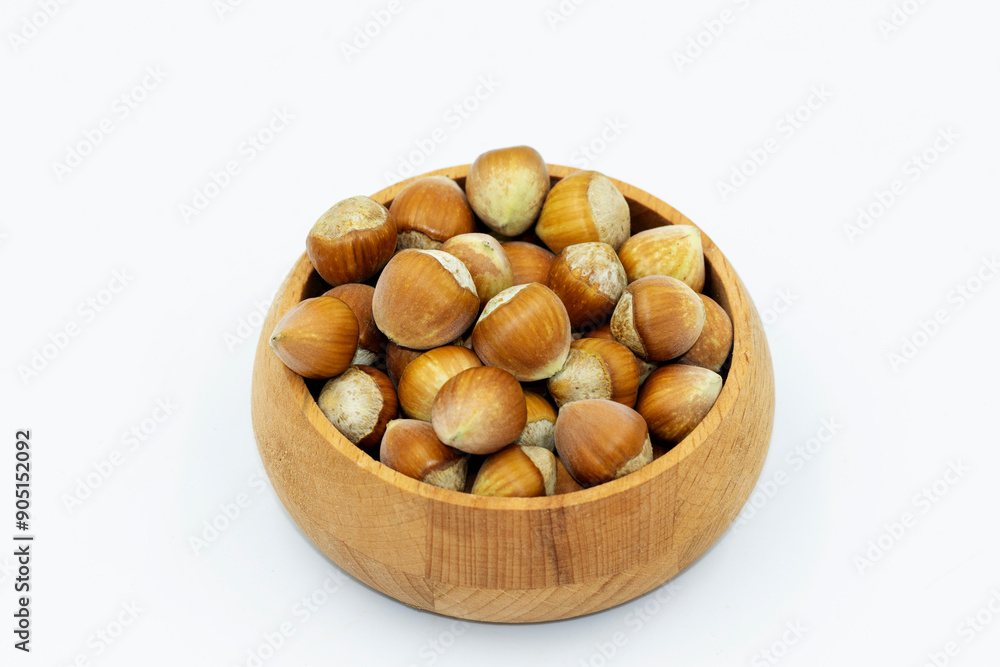 Fresh shelled hazelnut kernels on a snack plate Fresh shelled hazelnut kernels on a snack plate