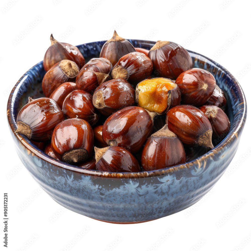 A beautiful blue bowl filled with delicious roasted chestnuts, perfect for autumn and holiday celebrations. A beautiful blue bowl filled with delicious roasted chestnuts, perfect for autumn and holiday celebrations.