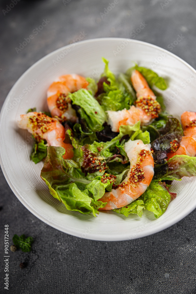 shrimp salad prawns or langoustines green leaf lettuce mix fresh meal food snack on the table copy space food background rustic top view shrimp salad prawns or langoustines green leaf lettuce mix fresh meal food snack on the table copy space food background rustic top view