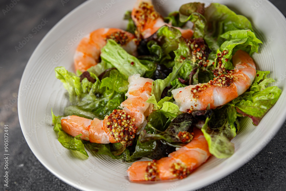 shrimp salad prawns or langoustines green leaf lettuce mix fresh meal food snack on the table copy space food background rustic top view shrimp salad prawns or langoustines green leaf lettuce mix fresh meal food snack on the table copy space food background rustic top view