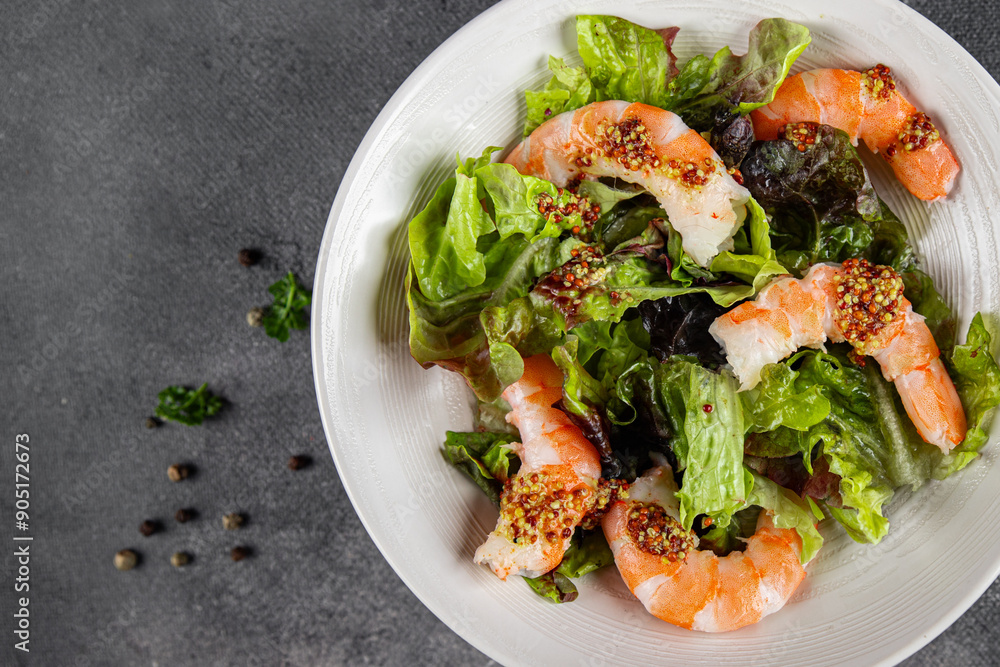 shrimp salad prawns or langoustines green leaf lettuce mix fresh meal food snack on the table copy space food background rustic top view shrimp salad prawns or langoustines green leaf lettuce mix fresh meal food snack on the table copy space food background rustic top view