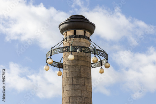 Lighting tower stylized as a lighthouse on Chrobry Embankment, (Hakena Terrace), Szczecin, Poland photo