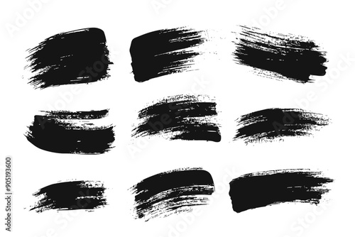 Strokes of black paint, brush, roller, spatula. Collection of brushes Smears of paint on a white background for your design