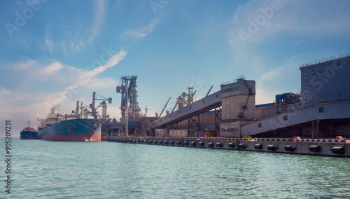 Industrial Seaport Novorossiysk in Russia. Port Cranes And Cargo Ships