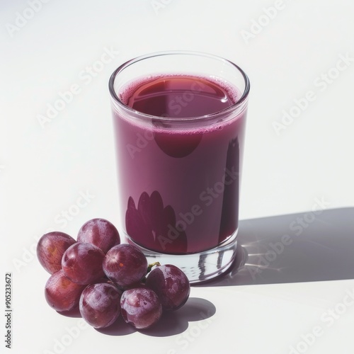 Wallpaper Mural Medium shot of Glass of grape juice near the grape, isolated on a white background  Torontodigital.ca