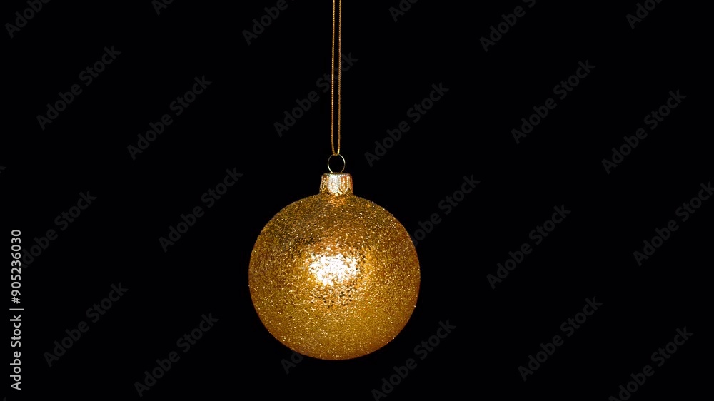 Isolated golden Christmas bauble ball hanging from top. Alpha channel - transparent background. Just paste into your project. Isolated golden Christmas bauble ball hanging from top. Alpha channel - transparent background. Just paste into your project.