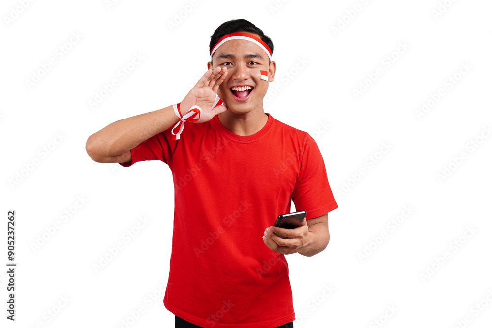 An Indonesian man celebrating Indonesia's independence day on 17 August while holding smartphone with blank screen isolated transparent An Indonesian man celebrating Indonesia's independence day on 17 August while holding smartphone with blank screen isolated transparent