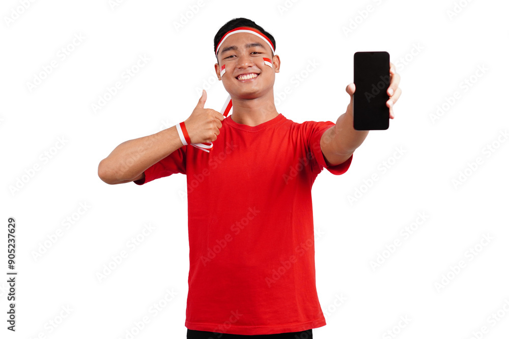 An Indonesian man celebrating Indonesia's independence day on 17 August while holding smartphone with blank screen isolated transparent An Indonesian man celebrating Indonesia's independence day on 17 August while holding smartphone with blank screen isolated transparent
