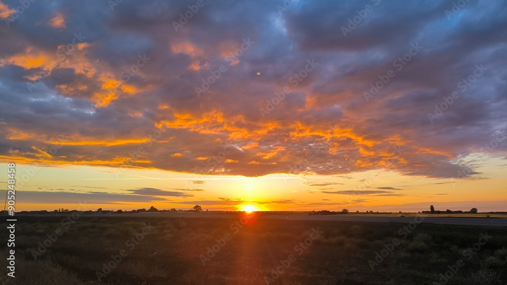 sunrise in Vojvodina with colorful cloudy sky sunrise in Vojvodina with colorful cloudy sky