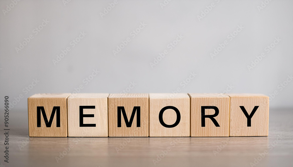 Wooden cubes with word MEMORY on table against light gray background. Wooden cubes with word MEMORY on table against light gray background.