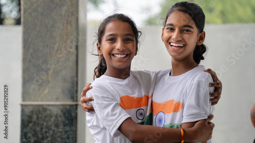 Photography Young and little Indian kids proudly holds the tricolour Indian flag
