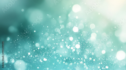 A mint abstract background featuring a fine, glittering texture. The tiny shimmering particles add a touch of glamour and sparkle. © Volodymyr