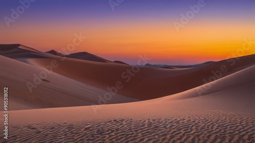 Sunset over the sand dunes in the desert background