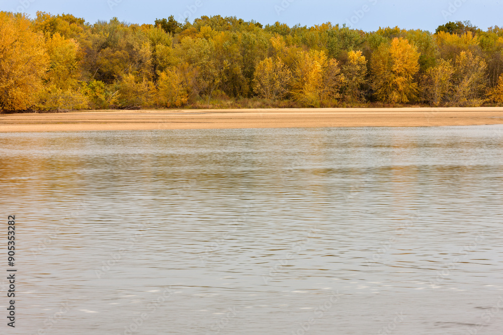 Looking across the Wisconsin River to the Spring Green side in mid-October, with the island trees changing colors. Looking across the Wisconsin River to the Spring Green side in mid-October, with the island trees changing colors.