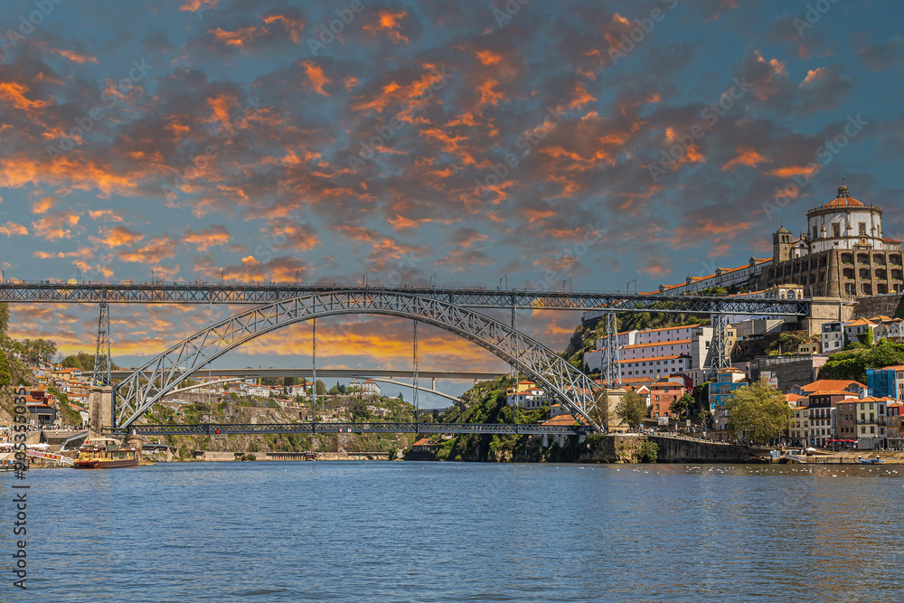 Obraz premium Dom Luis I Bridge over Douro river and Church of the Monastery of Santo Agostinho da Serra do Pilar, Porto, Portugal