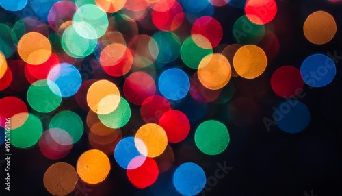  Colorful abstract lights on black background.Defocused image.