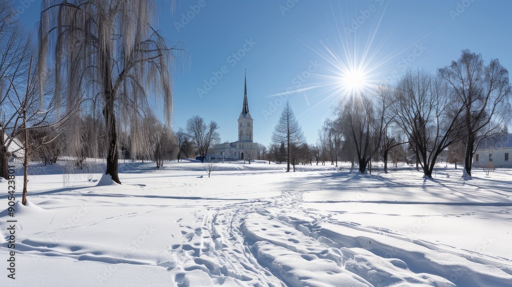 A winter landscape showcases a snowy park with trees and a historic building under a bright blue sky dotted with clouds A winter landscape showcases a snowy park with trees and a historic building under a bright blue sky dotted with clouds