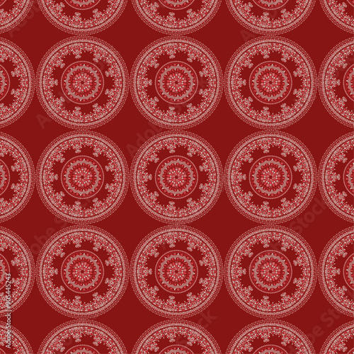 Seamless Batik floral embroidery pattern on Dark Red background Indian kalamkari Mandala Batik traditional block print design Ajrakh print Madhu Bani. Used for texture ,fabric ,clothing wrappings etc.