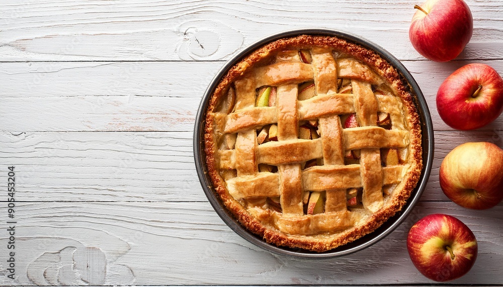 top view of an apple pie on a white table top view of an apple pie on a white table