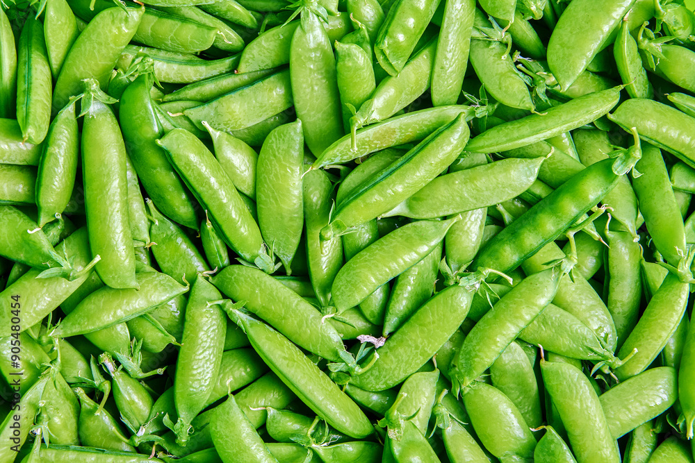 Texture of harvested garden peas on horizontal surface close-up nobody. Texture of harvested garden peas on horizontal surface close-up nobody.