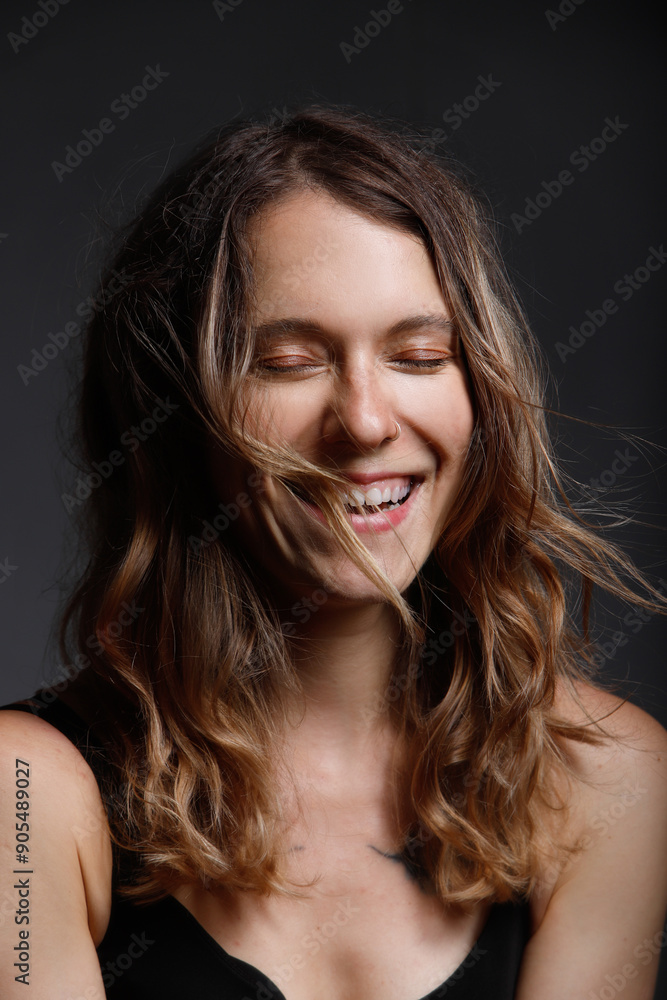 low key portrait of smiling girl