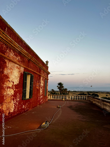 old house at sunset photo