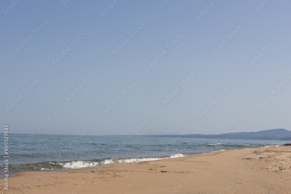 Serene Sandy Beach with Gentle Waves Serene Sandy Beach with Gentle Waves