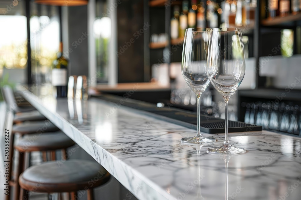 High-end marble bar top with blurred wine glasses and bottles, perfect for beverage showcases High-end marble bar top with blurred wine glasses and bottles, perfect for beverage showcases