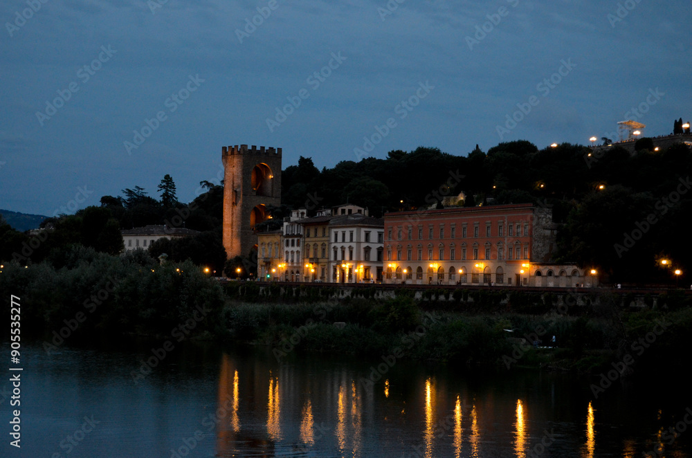 reflection of lights in the river of a street in Florence Italy reflection of lights in the river of a street in Florence Italy