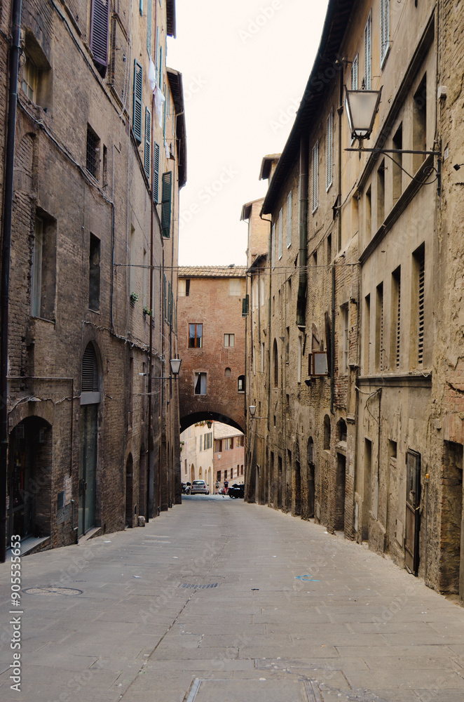 narrow street in old town of Sienna Italy narrow street in old town of Sienna Italy