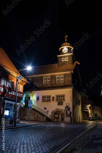 Obraz na płótnie Street alley in the small town of Schwabisch Hall, with houses and buildings with typical German architecture and street lanterns, at night. w salonie