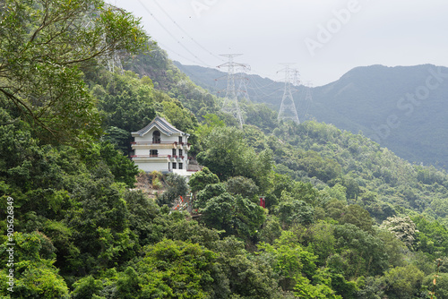 Photography A white pavilion on the side of a mountain in Hong Kong