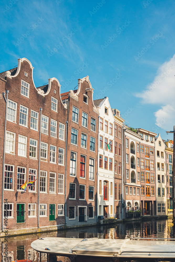 Historic canal houses on a sunny day in Amsterdam Historic canal houses on a sunny day in Amsterdam