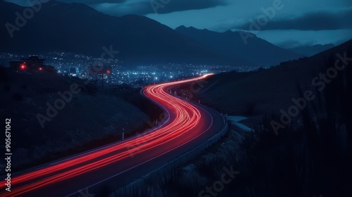 A long, curvy road with a bright red line of cars