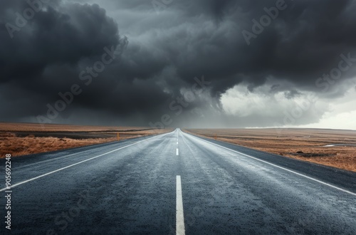 Lonely Rainy Road Under Dark Clouds in a Mountainous Landscape