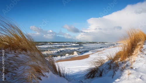 sonniger wintertag am meer dunen am strand sturmische ostsee darss photo