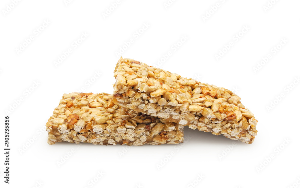 Sunflower seed Gozinaki or Kozinaki candy bar, traditional Georgian confection made of caramelized nuts or seeds, isolated on white background Sunflower seed Gozinaki or Kozinaki candy bar, traditional Georgian confection made of caramelized nuts or seeds, isolated on white background
