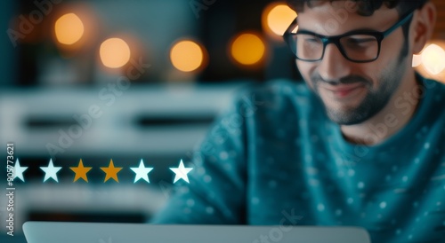 Typing on Laptop With Digital Stars Projected in a Low Light Setting