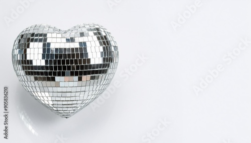 a discoball in the shape of a heart on a white background