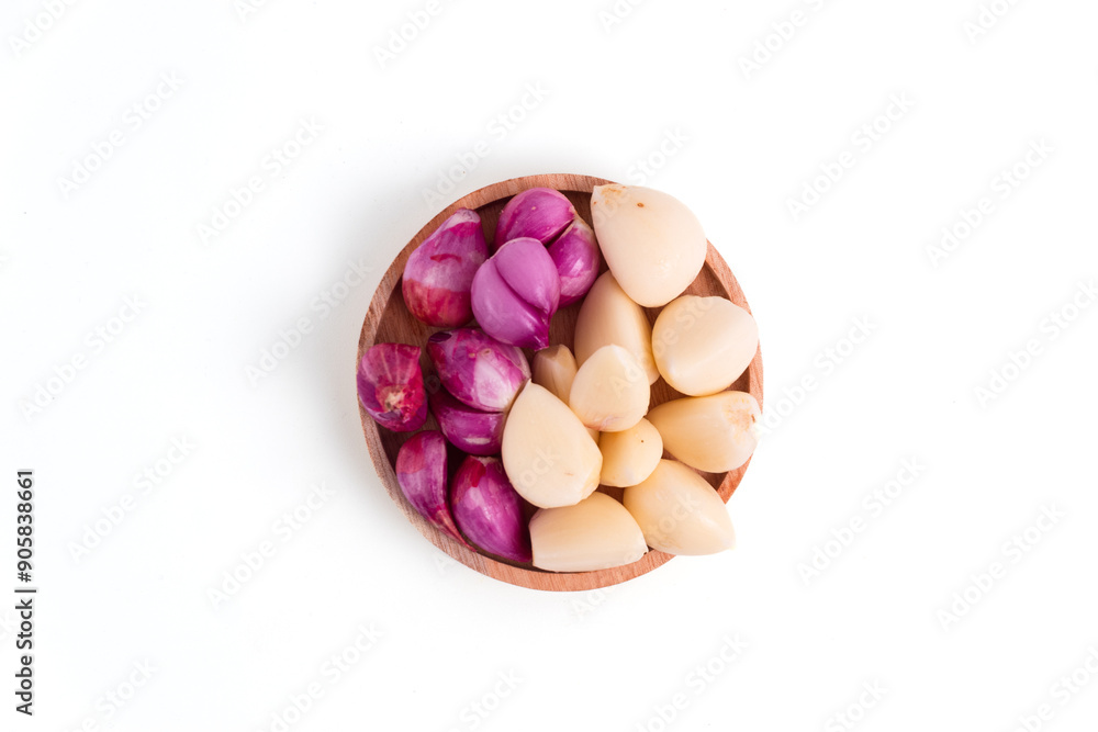 red onion and garlic in wooden container isolated on white background. Perfect for recipes, articles or any cooking content. red onion and garlic in wooden container isolated on white background. Perfect for recipes, articles or any cooking content.