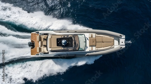 A luxurious rigid inflatable boat speeding across the sea with a powerful engine. photo