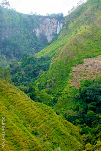 An iconic waterfall known as Sipiso - Piso Waterfall in Karo, Sumatra Utara, Indonesia. photo