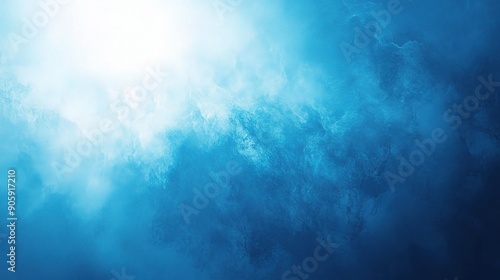 Sunlight pierces through swirling blue clouds, creating an ethereal and abstract underwater atmosphere. 