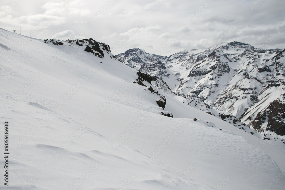 Snow covered mountains in winter Snow covered mountains in winter