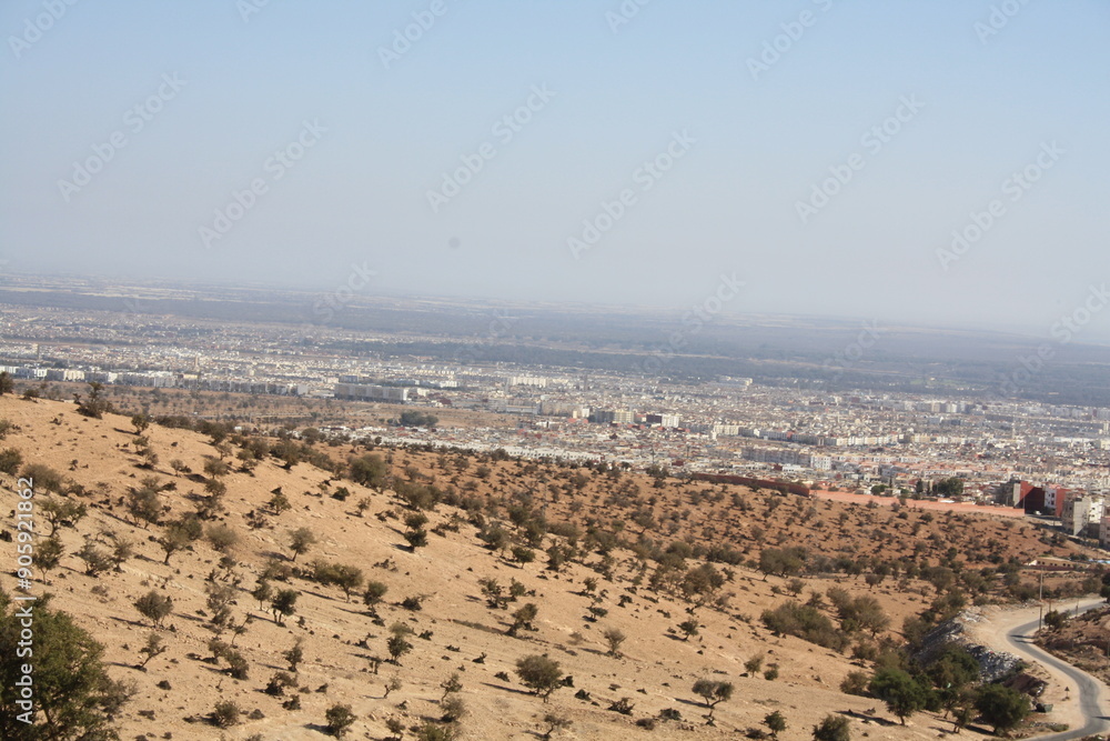 Obraz premium A view of the city of Agadir from the top of the mountain on July 29 2024.