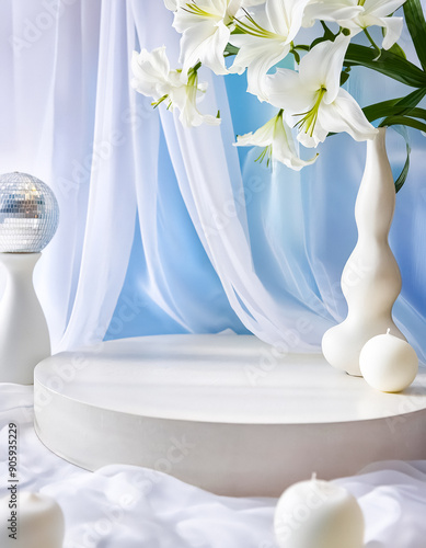 White lilies on a blue background with a white pedestal and candles